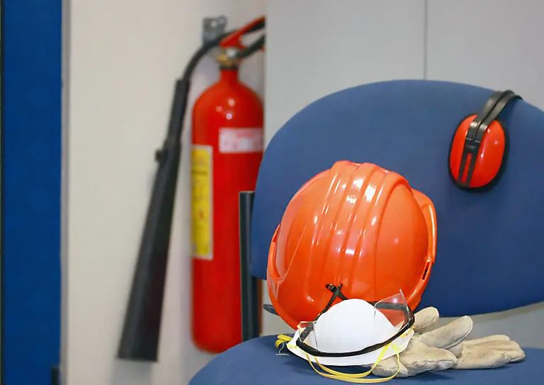 Safety and security equipment including fire extinguishers, helmets, and CCTV cameras